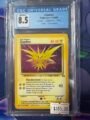 Zapdos Fossil Holo Rare 15/62 - CGC Gradé 8.5